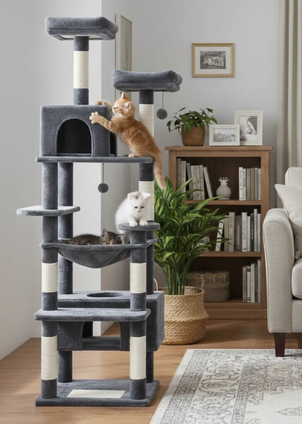 A Purrfait Citadel dark grey cat tower in a living room, with three kittens exploring the different levels, including the top perches and spacious middle condo, demonstrating its suitability for active cats.
